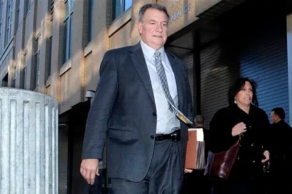 WHO IS R. LINDLEY DeVECCHIO?